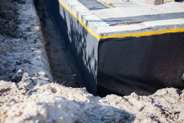 Professional Emergency Waterproofing technician working in Holland, NY